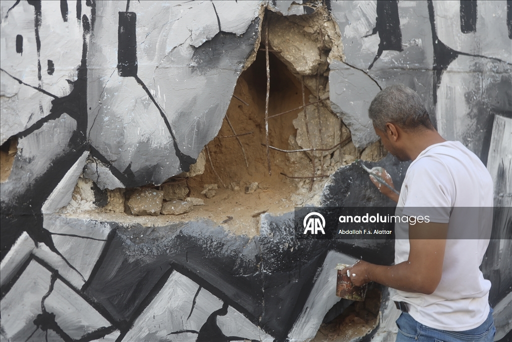 Палестинские художники нарисовали граффити, чтобы привлечь внимание к экологическому разрушению в Газе