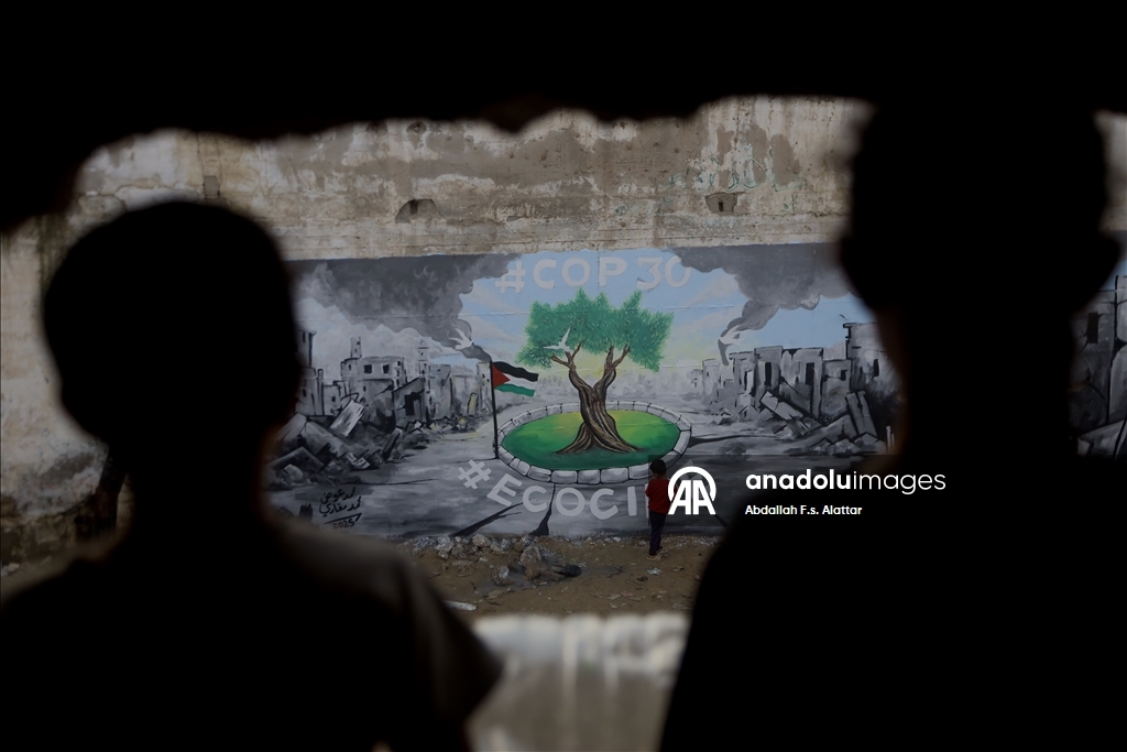 Палестинские художники нарисовали граффити, чтобы привлечь внимание к экологическому разрушению в Газе