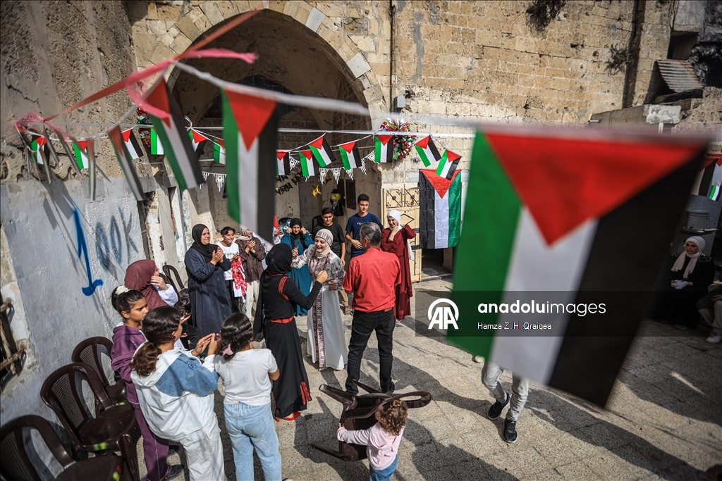 Palestinian student Iman Lulu celebrates exam success amid war-torn Gaza ​​​​​​​ 