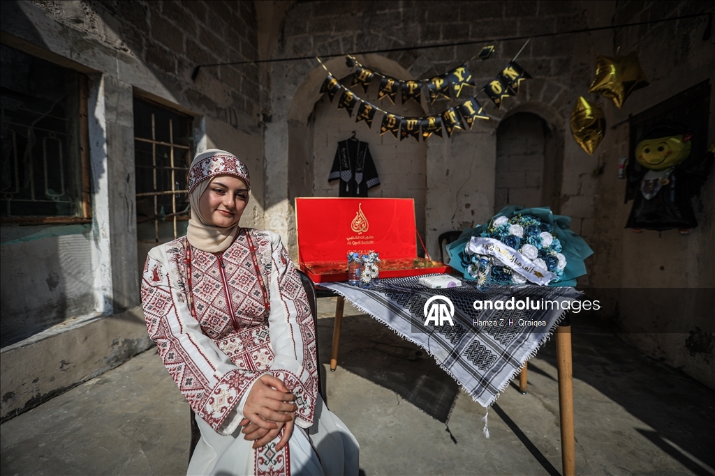 Palestinian student Iman Lulu celebrates exam success amid war-torn Gaza ​​​​​​​ 