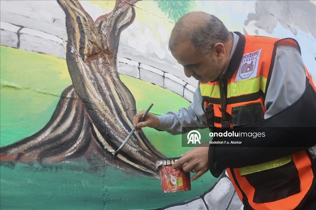 Палестинские художники нарисовали граффити, чтобы привлечь внимание к экологическому разрушению в Газе