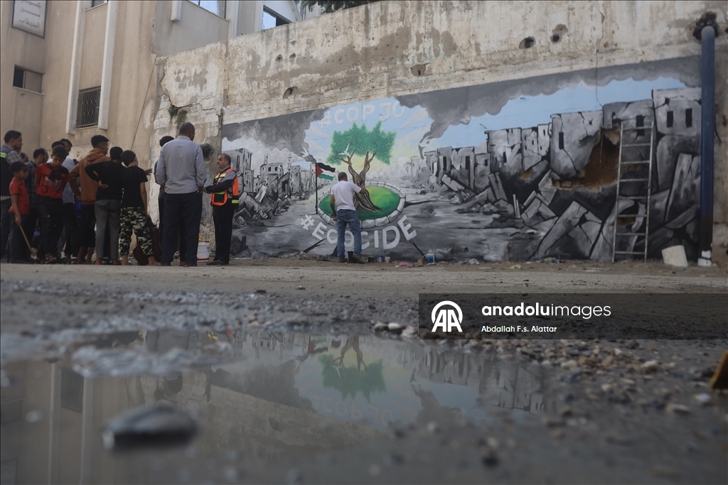 Палестинские художники нарисовали граффити, чтобы привлечь внимание к экологическому разрушению в Газе