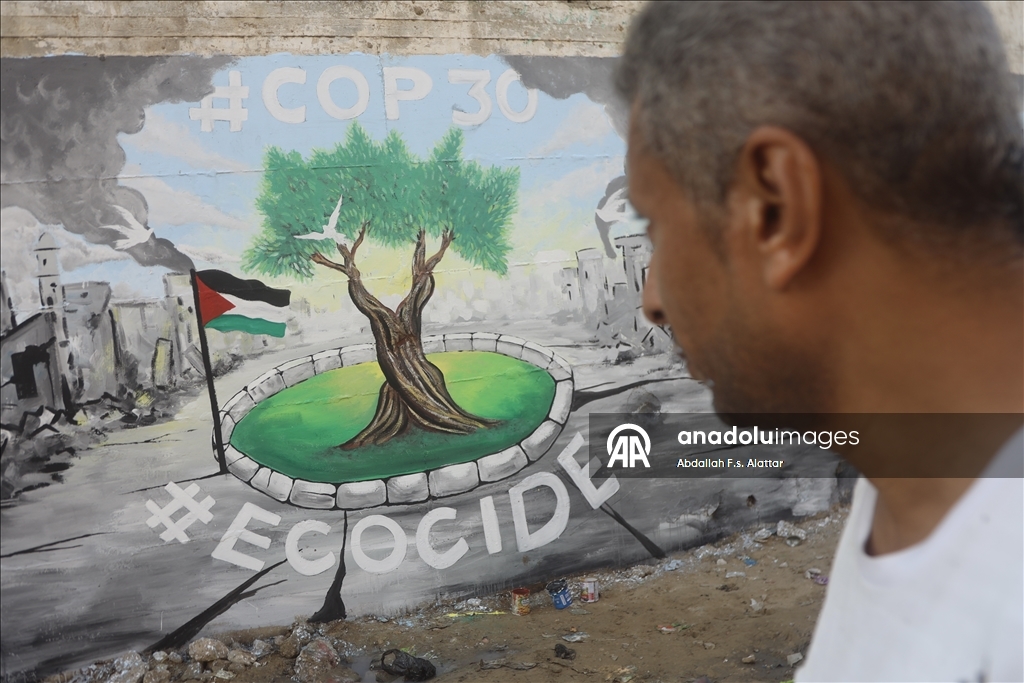 Палестинские художники нарисовали граффити, чтобы привлечь внимание к экологическому разрушению в Газе