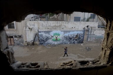 Палестинские художники нарисовали граффити, чтобы привлечь внимание к экологическому разрушению в Газе