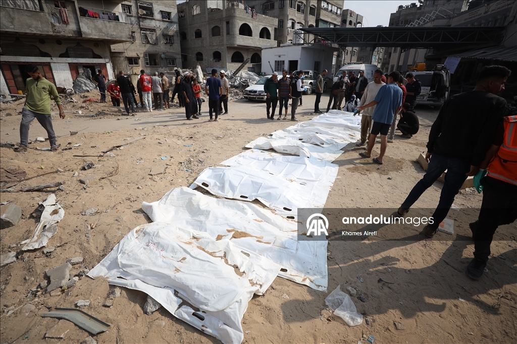 Извлечены тела палестинцев, убитых в результате израильских атак и захороненных во временных могилах