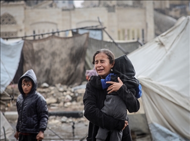 Palestinians struggle in makeshift shelters amid rain