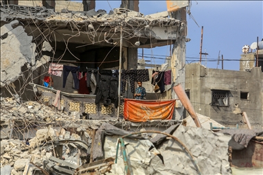 Палестинцы возвращаются в разрушенные дома после вывода израильских войск из района аль-Катиба