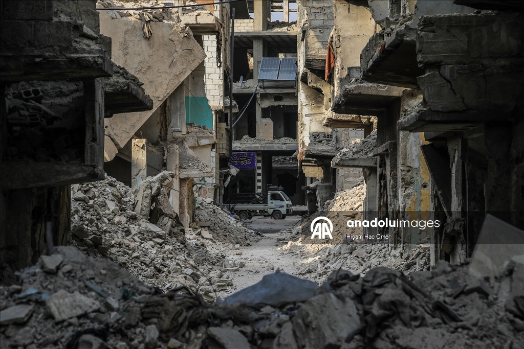 Будничная жизнь среди руин в лагере Ярмук в Дамаске