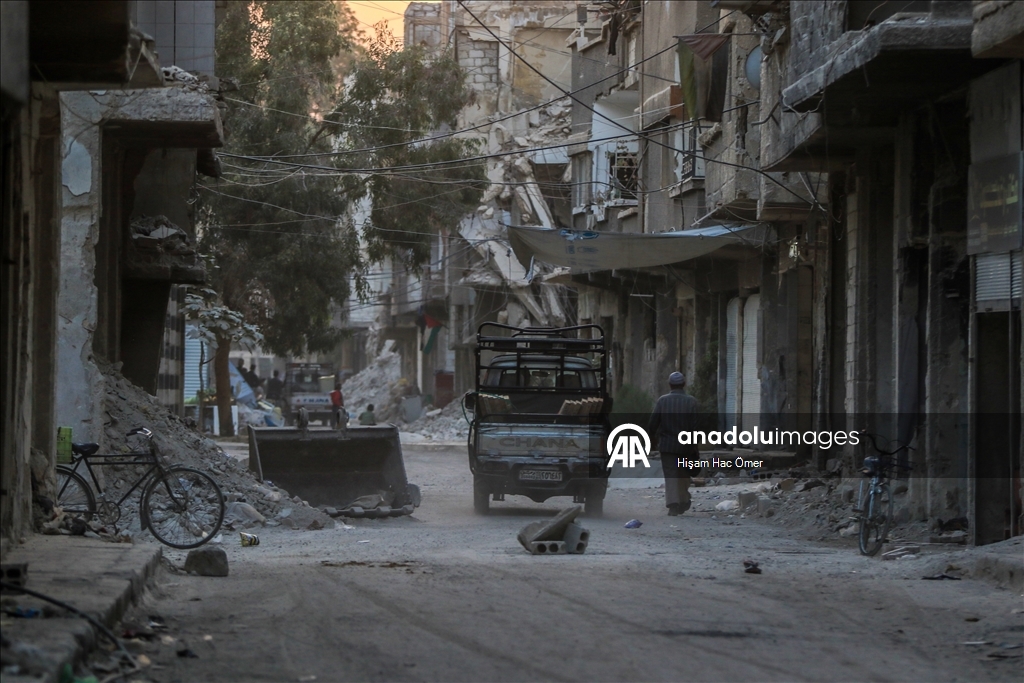 Будничная жизнь среди руин в лагере Ярмук в Дамаске