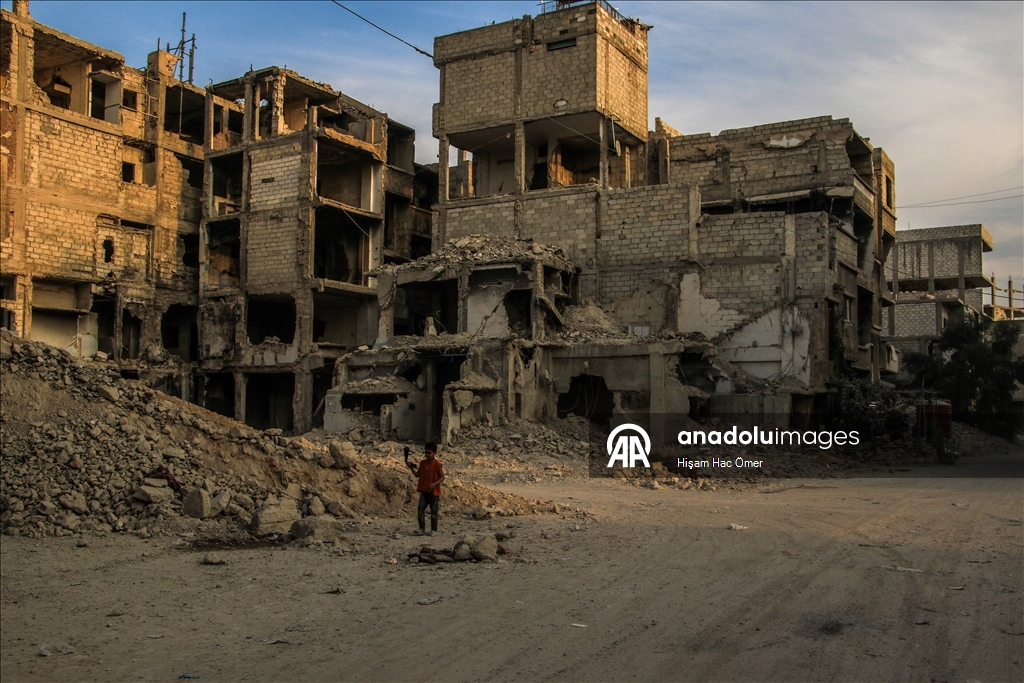 Будничная жизнь среди руин в лагере Ярмук в Дамаске
