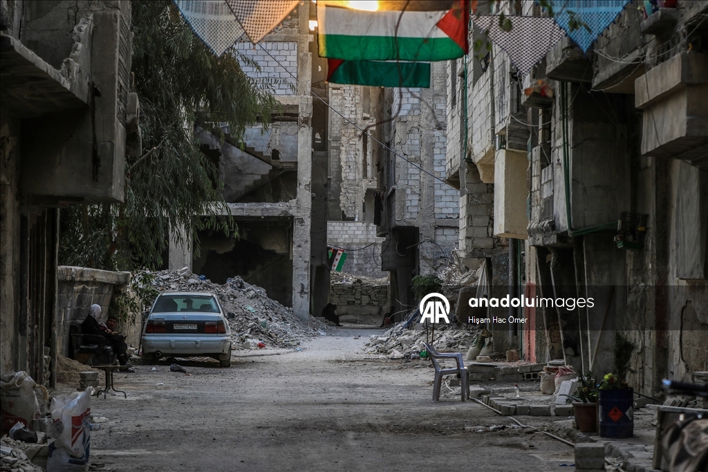 Будничная жизнь среди руин в лагере Ярмук в Дамаске