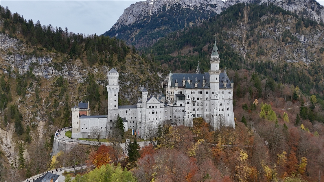 Neuschwanstein Castle surrounded by seasonal colors in Germany
