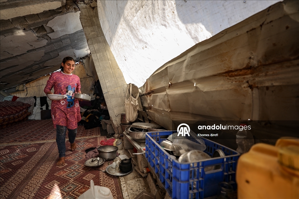 Palestinians try to survive in makeshift tents on top of rubbles of destroyed buildings in Gaza
