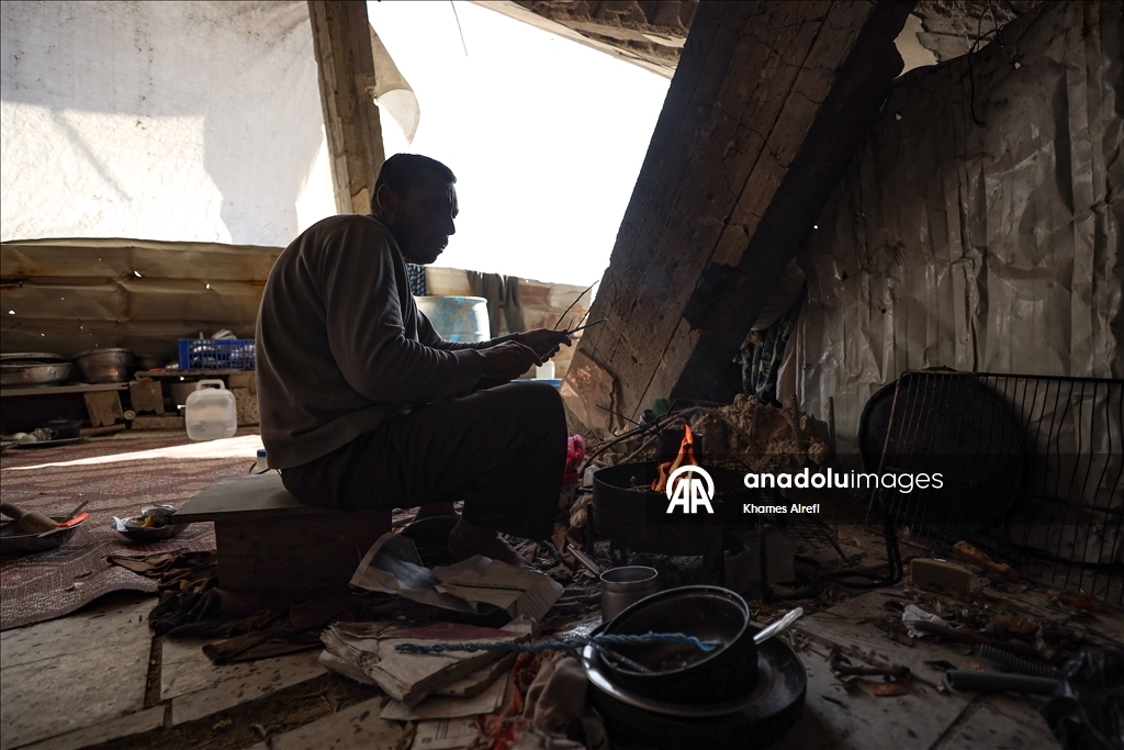 Palestinians try to survive in makeshift tents on top of rubbles of destroyed buildings in Gaza
