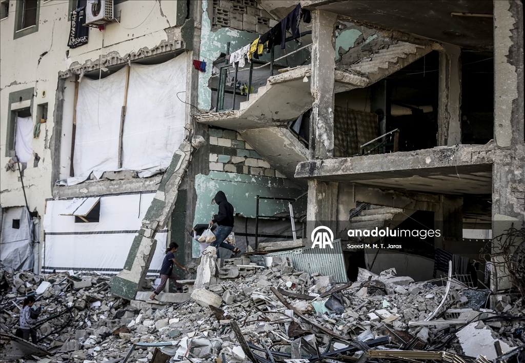 Палестинские семьи в Газе вынуждены жить среди руин 3