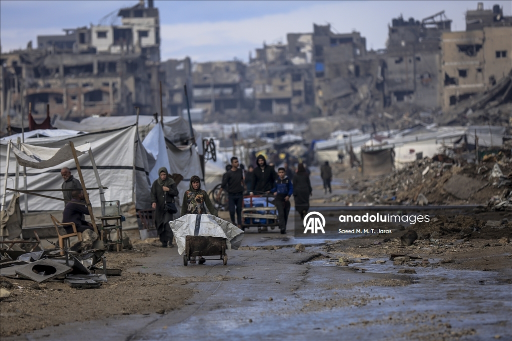 Displaced Palestinians in Gaza struggle against harsh weather conditions in tents