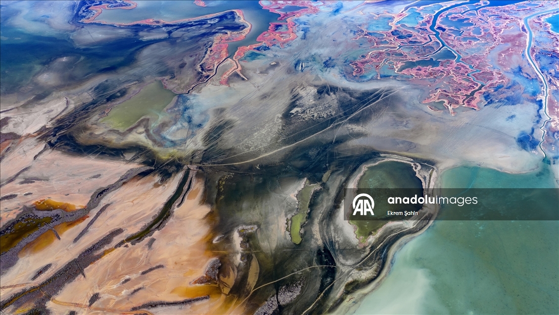 Natural formations on the water surface stand out at Yumurtalik Lagoon in Turkiye’s Adana