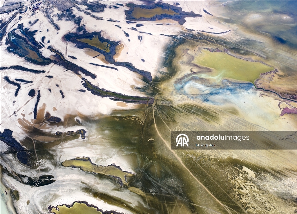 Natural formations on the water surface stand out at Yumurtalik Lagoon in Turkiye’s Adana