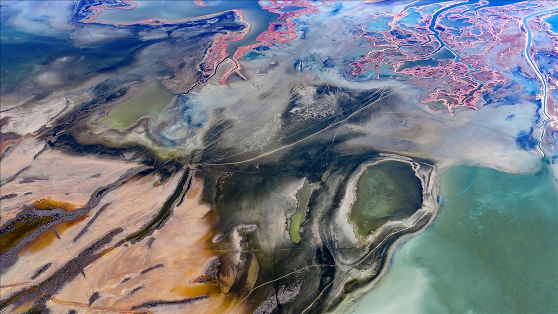 Natural formations on the water surface stand out at Yumurtalik Lagoon in Turkiye’s Adana