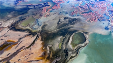 Natural formations on the water surface stand out at Yumurtalik Lagoon in Turkiye’s Adana