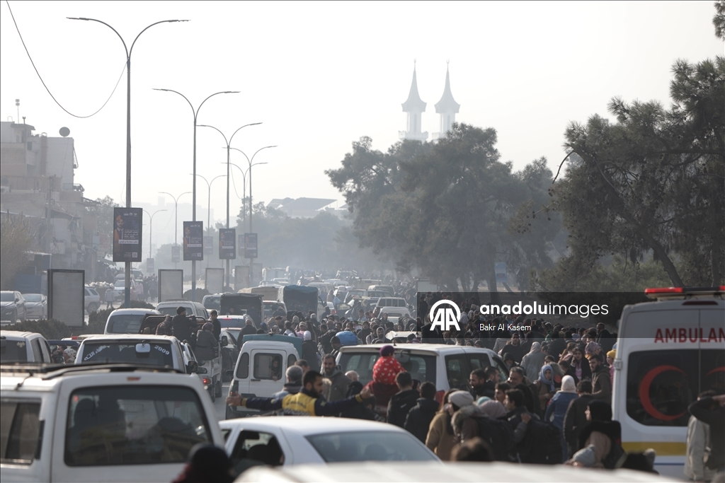 Civilians are evacuated after clashes in Aleppo