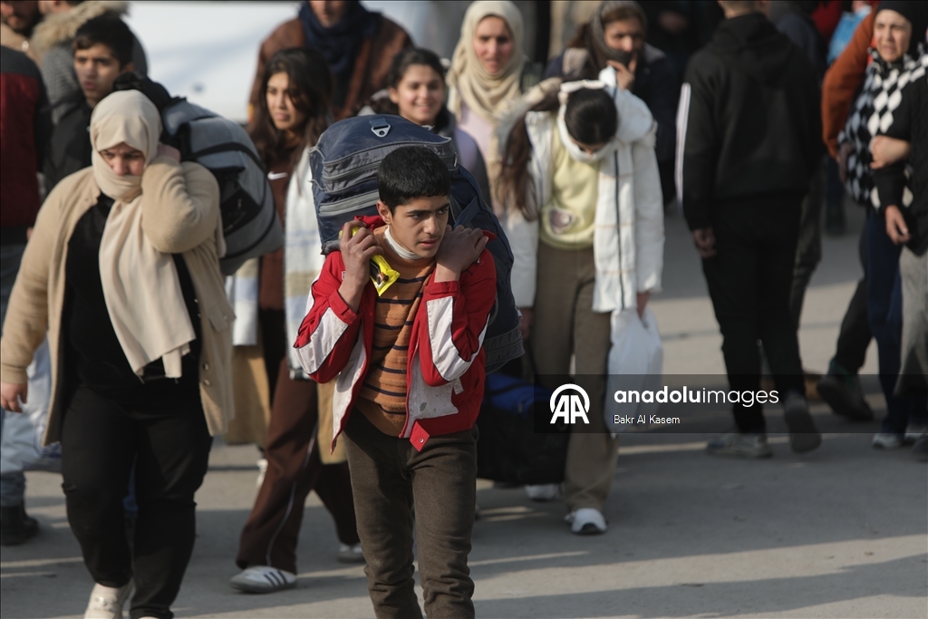 Civilians are evacuated after clashes in Aleppo