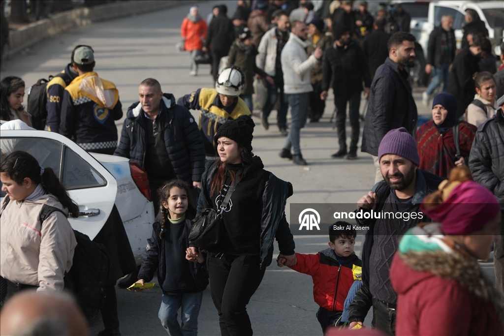 Civilians are evacuated after clashes in Aleppo