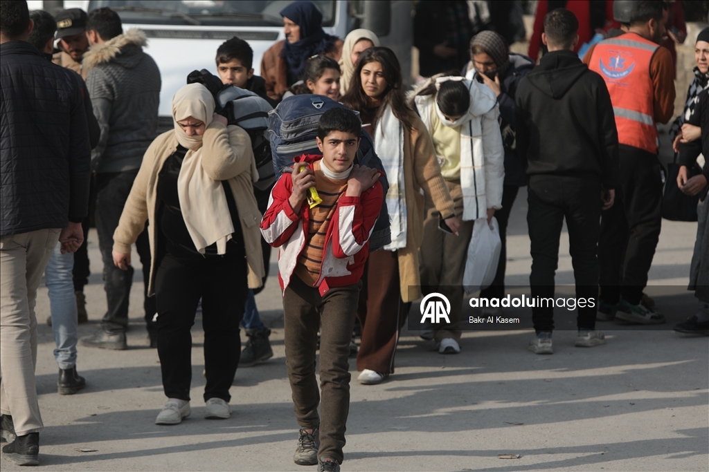 Civilians are evacuated after clashes in Aleppo