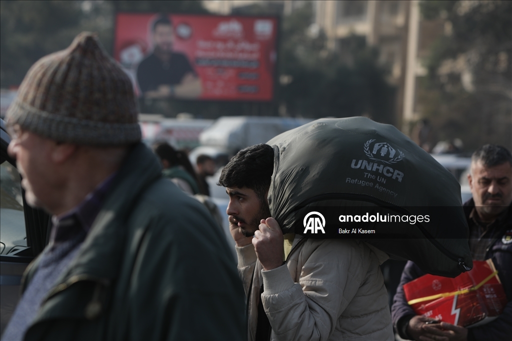 Civilians are evacuated after clashes in Aleppo