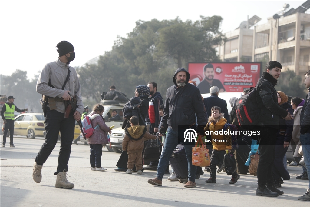 Civilians are evacuated after clashes in Aleppo