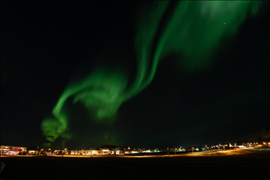 Northern lights illuminate Reykjavik during powerful geomagnetic storm