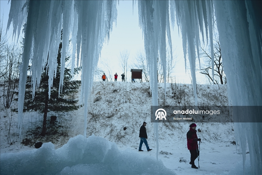 Spectacular ice fall Siklava Skala attracts hundreds during cold winter days in Slovakia