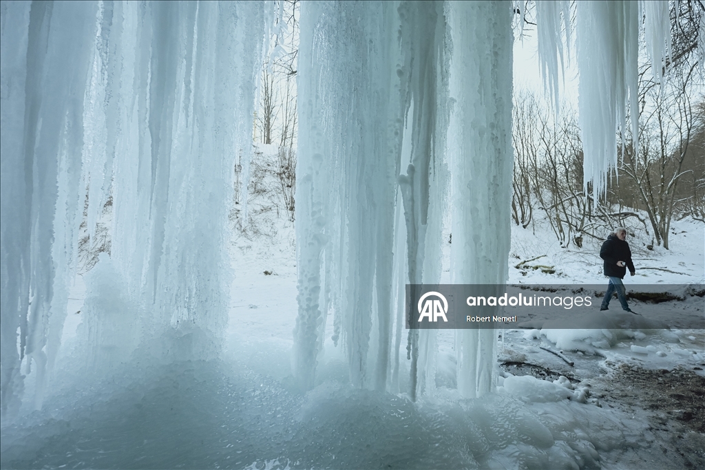 Spectacular ice fall Siklava Skala attracts hundreds during cold winter days in Slovakia