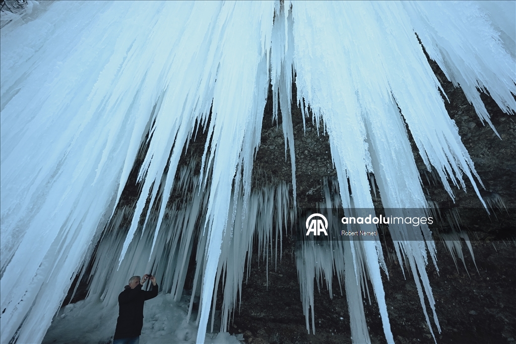 Spectacular ice fall Siklava Skala attracts hundreds during cold winter days in Slovakia