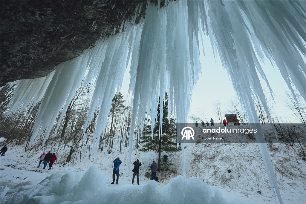 Spectacular ice fall Siklava Skala attracts hundreds during cold winter days in Slovakia