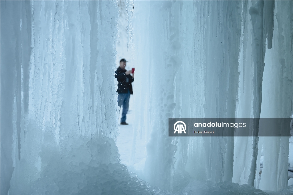 Spectacular ice fall Siklava Skala attracts hundreds during cold winter days in Slovakia