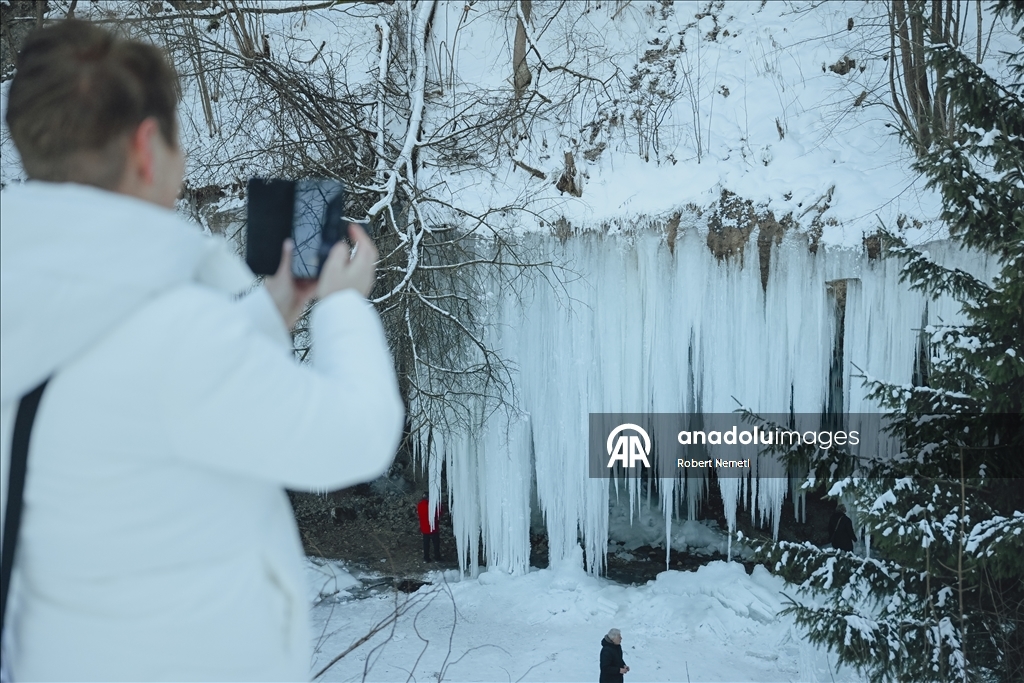 Spectacular ice fall Siklava Skala attracts hundreds during cold winter days in Slovakia