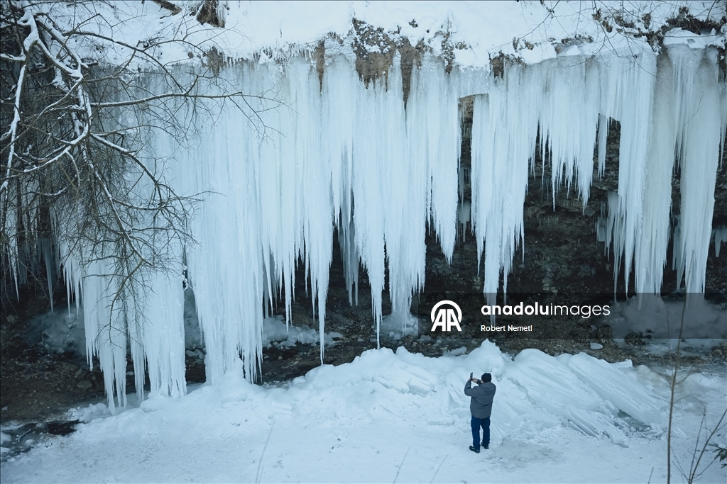 Spectacular ice fall Siklava Skala attracts hundreds during cold winter days in Slovakia