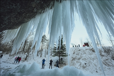 Spectacular ice fall Siklava Skala attracts hundreds during cold winter days in Slovakia