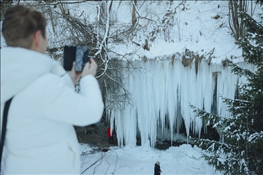 Spectacular ice fall Siklava Skala attracts hundreds during cold winter days in Slovakia