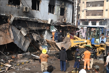 Число погибших при пожаре в торговом центре в Пакистане возросло до 14