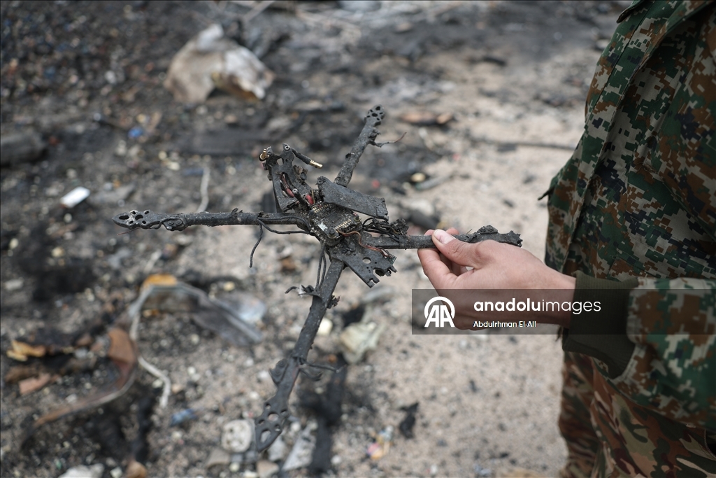AA, terör örgütü YPG/SDG'nin patlattığı silah deposunu görüntüledi