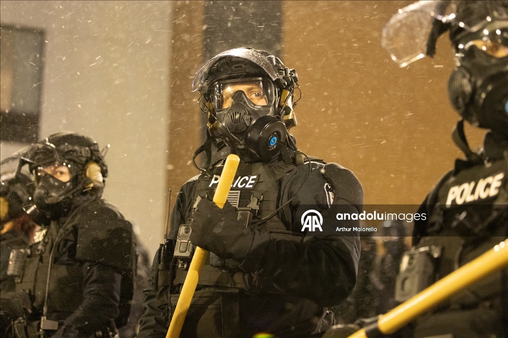 Protesters hold demonstration in front of a hotel believed to be housing federal immigration agents in Minneapolis