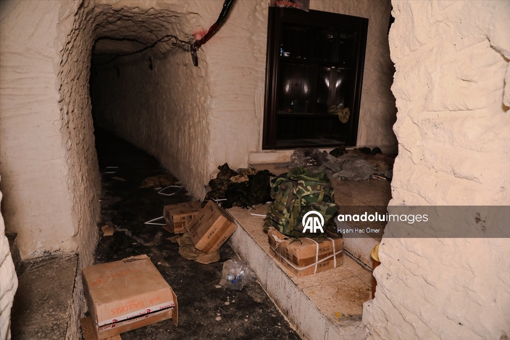 AA, terör örgütü YPG'nin Aynularab'a bağlı Sırrin beldesinde inşa ettiği "yer altı şehrini" görüntüledi