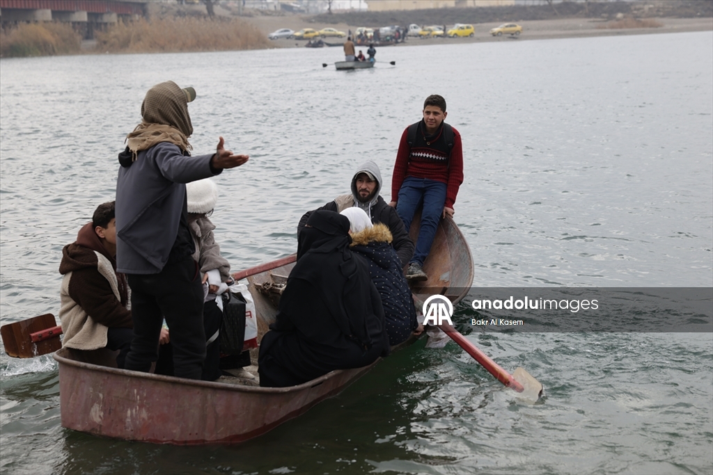 Suriye hükümeti, terör örgütü YPG'nin Rakka'da patlattığı köprüleri tadilata başladı