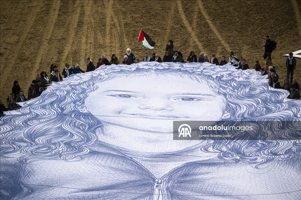 Giant portrait displayed in Barcelona to honor Palestinian child Hind Rajab