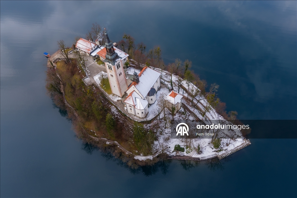 Slovenia's Lake Bled offers stunning views as fog blankets historic island