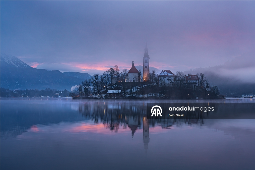 Slovenia's Lake Bled offers stunning views as fog blankets historic island