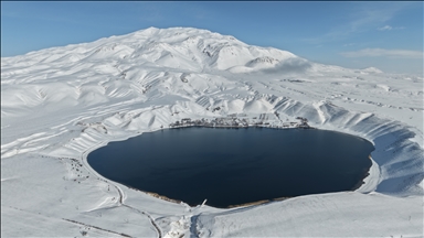  Mount Suphan and Lake Aygir covered in snow in Turkiye's Bitlis