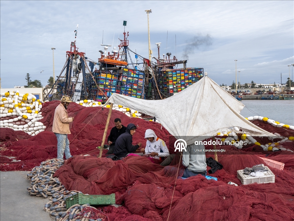 Fishermen continue their daily work at the port in the city of Essaouira, Morocco.